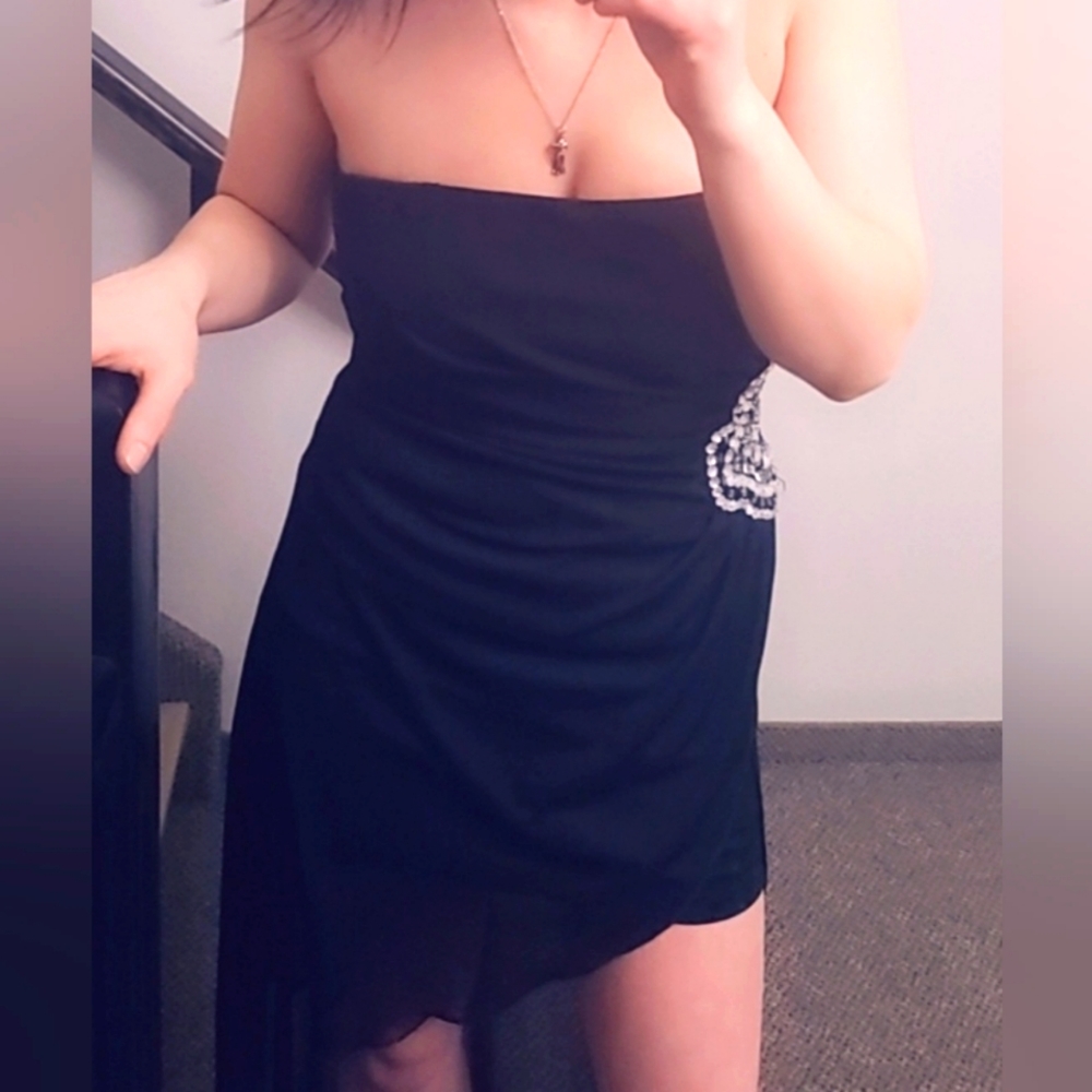 21.) NYE Black Strapless Asymetrical Dress With Fancy Design On Ruched Hip